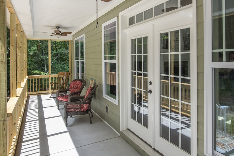 House Design - Exterior - Covered Porch 1 for Farmhouse House Plan #929-1044 - 3 bed, 2 bath