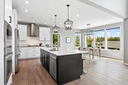 Contemporary Style House Plan - 3 Beds 3 Baths 2589 Sq/Ft Plan #1070-145 Photo 