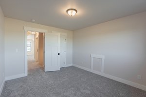 Interior - Bedroom 3 for Farmhouse House Plan #1070-127 - 4 bed, 3 bath