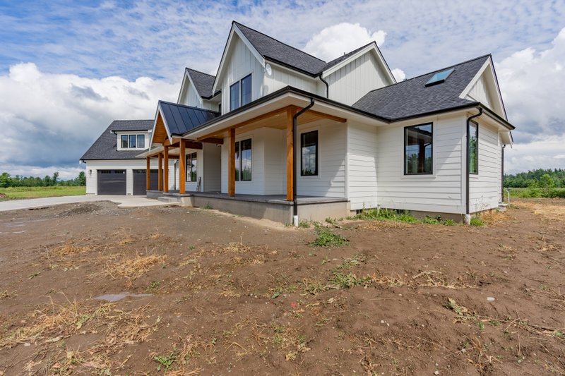 House Design - Exterior - Front Elevation for Farmhouse House Plan #1070-39 - 3 bed, 3.5 bath