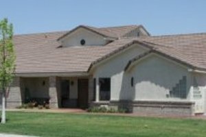 Adobe / Southwestern Exterior - Front Elevation Plan #1-834