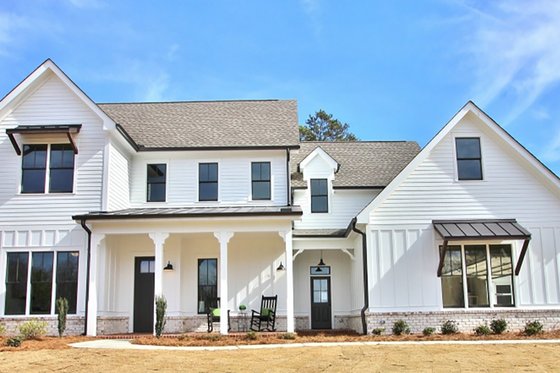 Exterior - Front Elevation for Farmhouse House Plan #927-990 - 4 bed, 4 bath