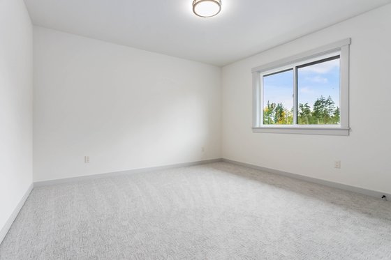 Interior - Bedroom 2 for Contemporary House Plan #1070-273 - 4 bed, 2.5 bath