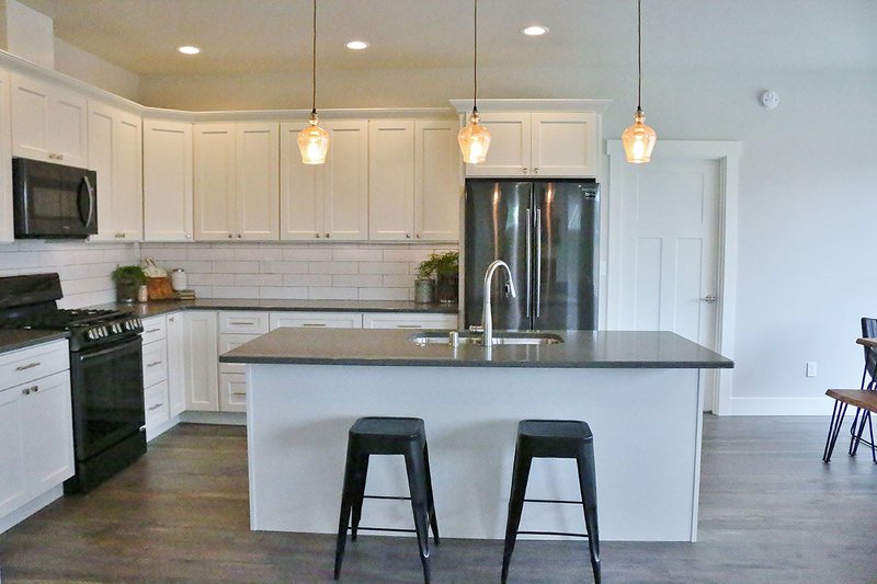 Dream House Plan - Interior - Kitchen for Craftsman House Plan #1070-47 - 3 bed, 2 bath