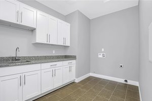 Interior - Laundry for Traditional House Plan #1066-95 - 4 bed, 4 bath