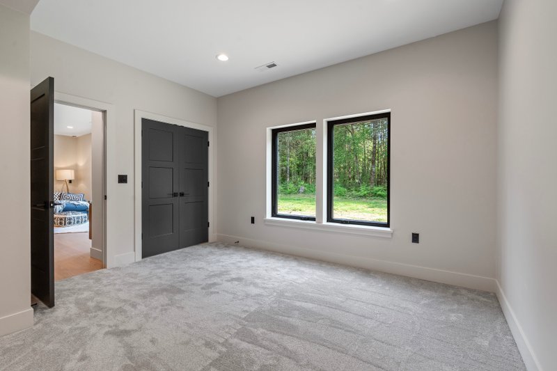 Dream House Plan - Interior - Bedroom 1 for Contemporary House Plan #1070-215 - 3 bed, 3 bath
