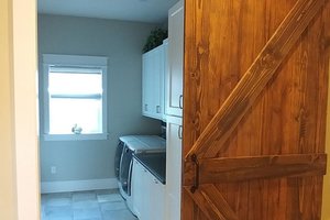 Interior - Laundry for Ranch House Plan #1058-173 - 3 bed, 3 bath