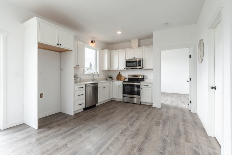 Architectural House Design - Photo 3 for Ranch House Plan #1070-182 - 1 bed, 1 bath