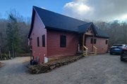 Cabin Style House Plan - 2 Beds 2 Baths 1500 Sq/Ft Plan #932-845 