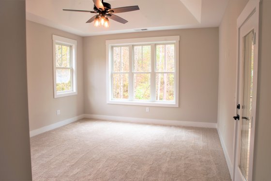 Farmhouse Plan 927-980 Primary Suite Bedroom