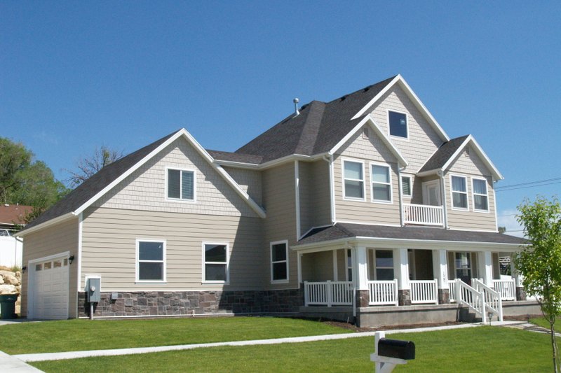 Architectural House Design - Exterior - Front Elevation 3 for Farmhouse House Plan #1060-140 - 5 bed, 2.5 bath