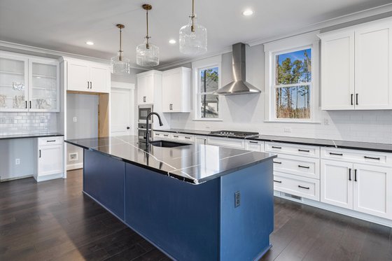 Photo 10 for Country House Plan #1080-8 - 4 bed, 3 bath