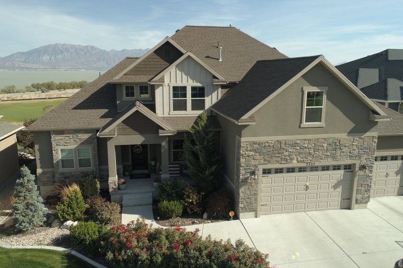 Architectural House Design - Exterior - Front Elevation 4 for Traditional House Plan #1060-69 - 5 bed, 4.5 bath