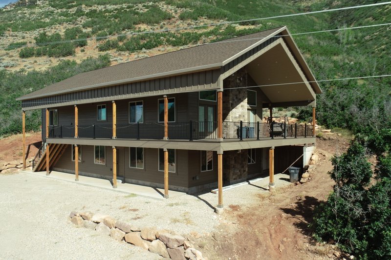 Dream House Plan - Exterior - Front Elevation 1 for Cabin House Plan #1060-355 - 2 bed, 2 bath