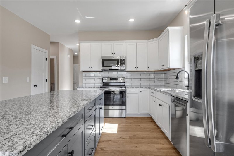 Architectural House Design - Interior - Kitchen 3 for Craftsman House Plan #20-1220 - 3 bed, 2.5 bath