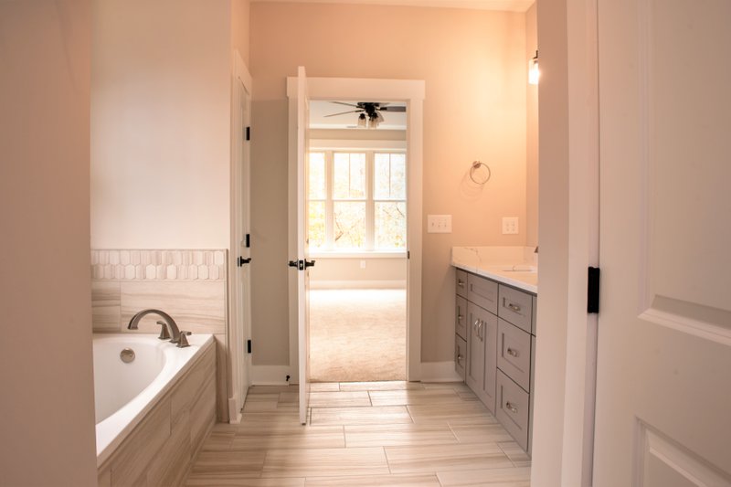 Architectural House Design - Farmhouse Plan 927-980 Primary Suite Bathroom