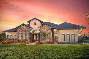 Mediterranean Exterior - Front Elevation Plan #938-90