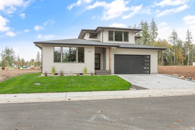 House Blueprint - Exterior - Front Elevation 2 for Contemporary House Plan #1070-273 - 4 bed, 2.5 bath