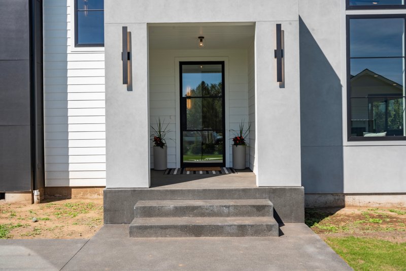 House Design - Exterior - Covered Porch 1 for Contemporary House Plan #1070-214 - 4 bed, 3.5 bath