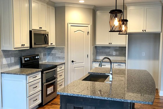 Interior - Kitchen 2 for Ranch House Plan #437-77 - 3 bed, 2.5 bath