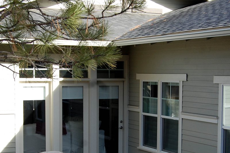 Dream House Plan - Exterior - Rear Elevation 1 for Craftsman House Plan #895-21 - 3 bed, 2 bath