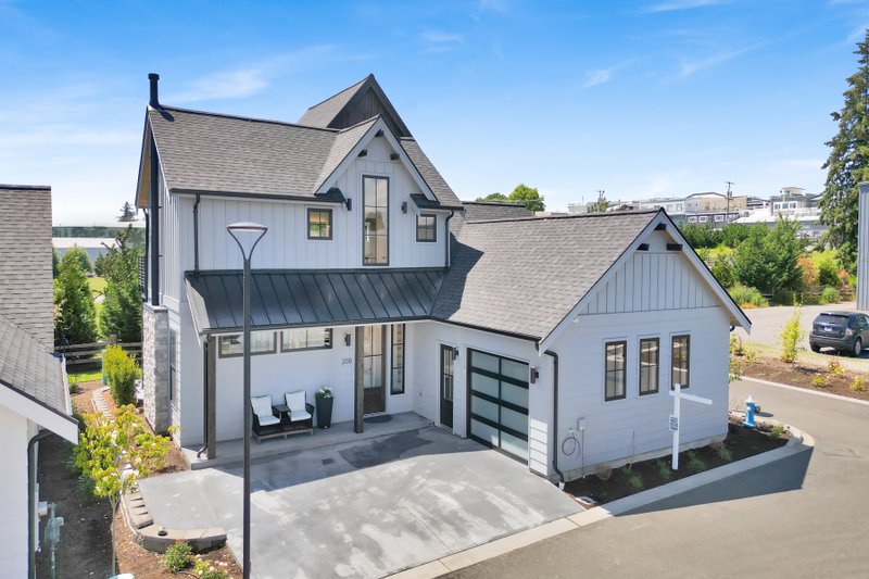 Architectural House Design - Exterior - Front Elevation 4 for Contemporary House Plan #1070-244 - 3 bed, 2.5 bath