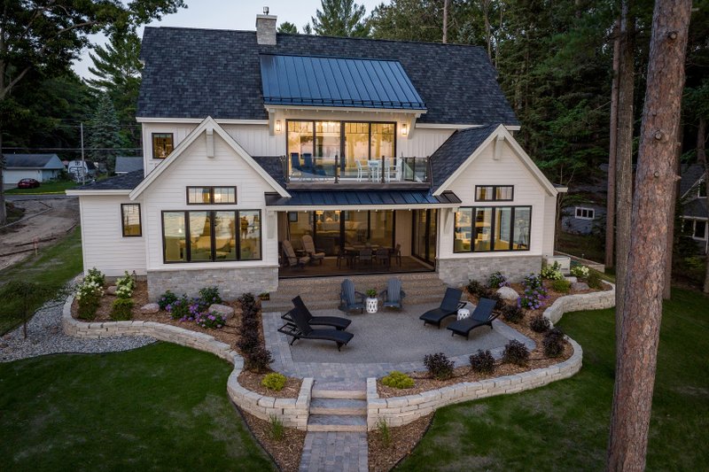 Farmhouse Style House Plan - 3 Beds 3.5 Baths 4009 Sq/Ft Plan #928-399 Exterior