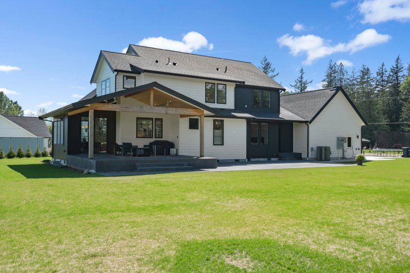 House Design - Exterior - Rear Elevation for Contemporary House Plan #1070-214 - 4 bed, 3.5 bath