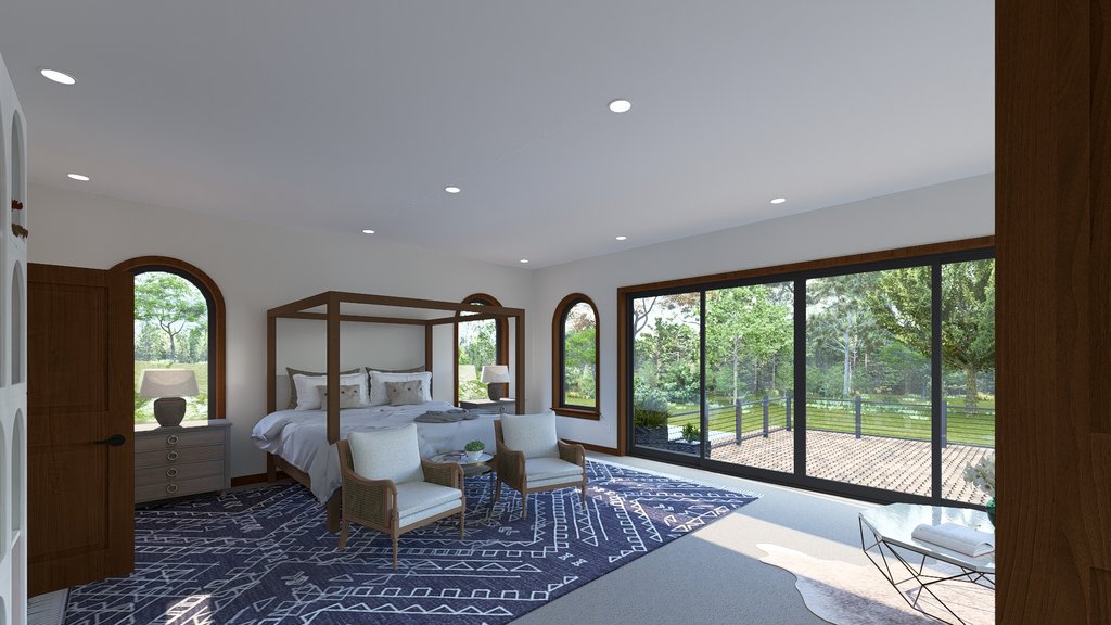 Large bedroom with arched windows and glass doors to a deck
