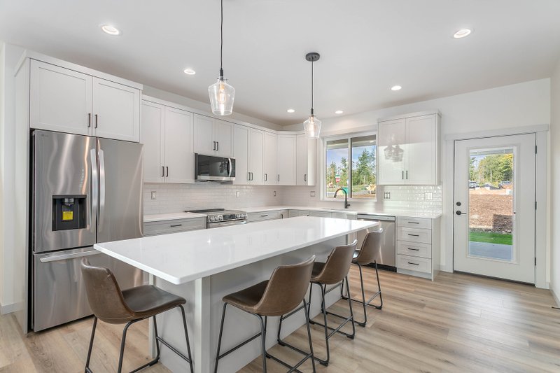 House Blueprint - Interior - Kitchen for Contemporary House Plan #1070-273 - 4 bed, 2.5 bath