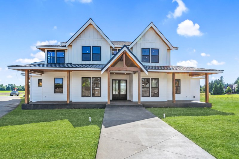 Dream House Plan - Farmhouse Exterior - Front Elevation Plan #1070-135