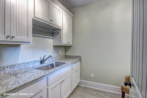 Interior - Laundry for Ranch House Plan #929-1013 - 3 bed, 2 bath