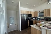 Contemporary Style House Plan - 2 Beds 2 Baths 1359 Sq/Ft Plan #932-339 