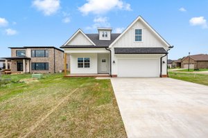 Home Plan - Farmhouse Exterior - Front Elevation Plan #20-2398