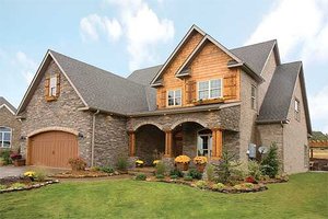 Traditional home with Craftsman details elevation photo