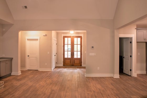 Farmhouse Plan 927-980 Great Room and Foyer