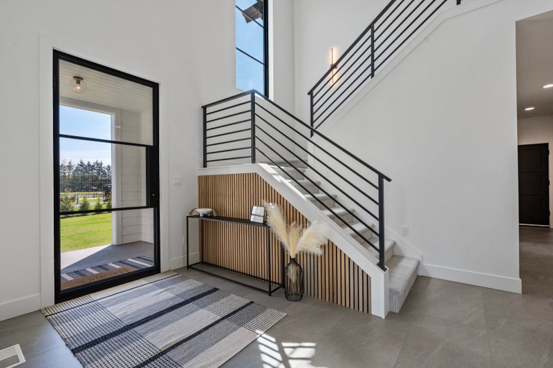 House Design - Interior - Entry for Contemporary House Plan #1070-214 - 4 bed, 3.5 bath