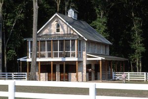 Country barn for horses with living space elevation